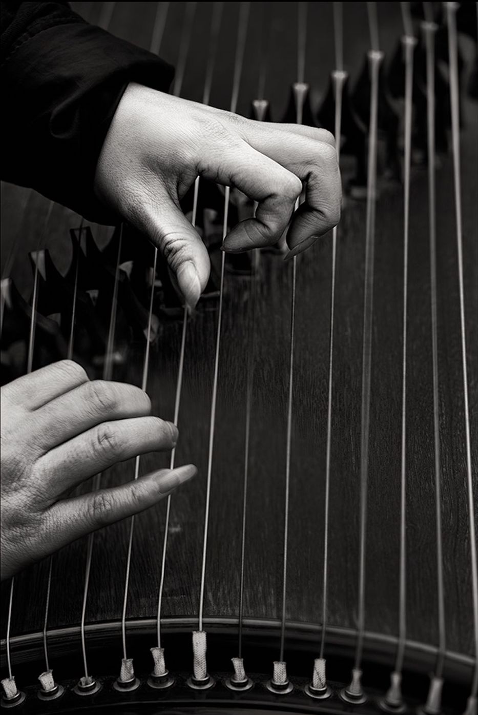 hands playing instrument